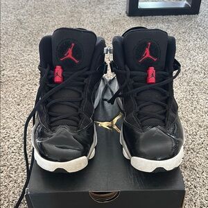 Black and Red Sneakers with White Soles